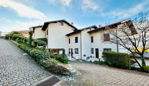 TAINO - VENDESI VILLETTA A SCHIERA CON SPLENDIDO PANORAMA